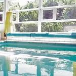 Kranich Ferienhaeuser Mit Innenpool *