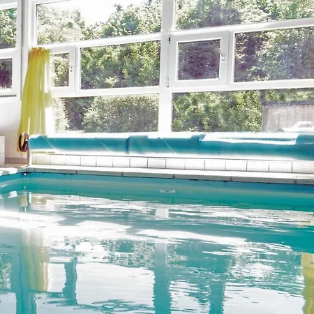 Kranich Ferienhaeuser Mit Innenpool *