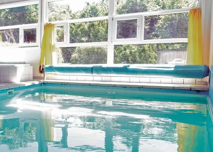 Kranich Ferienhaeuser Mit Innenpool *